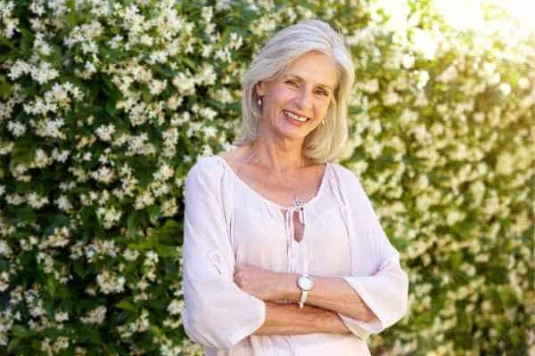 Older woman happy with urinary incontinence treatment Busby